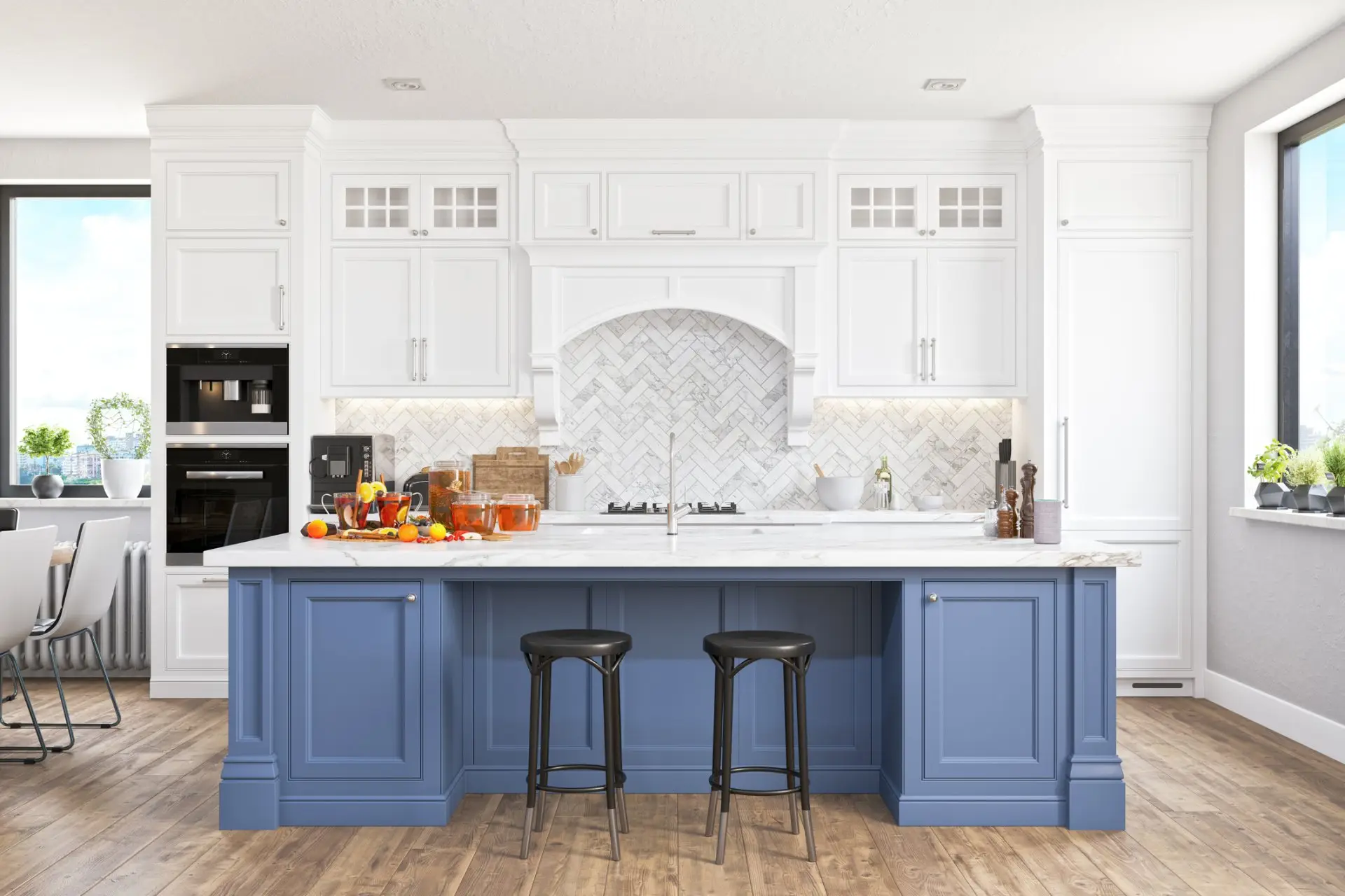 Kitchen with white painted cabinets, a herringbone marble backsplash and a blue painted island