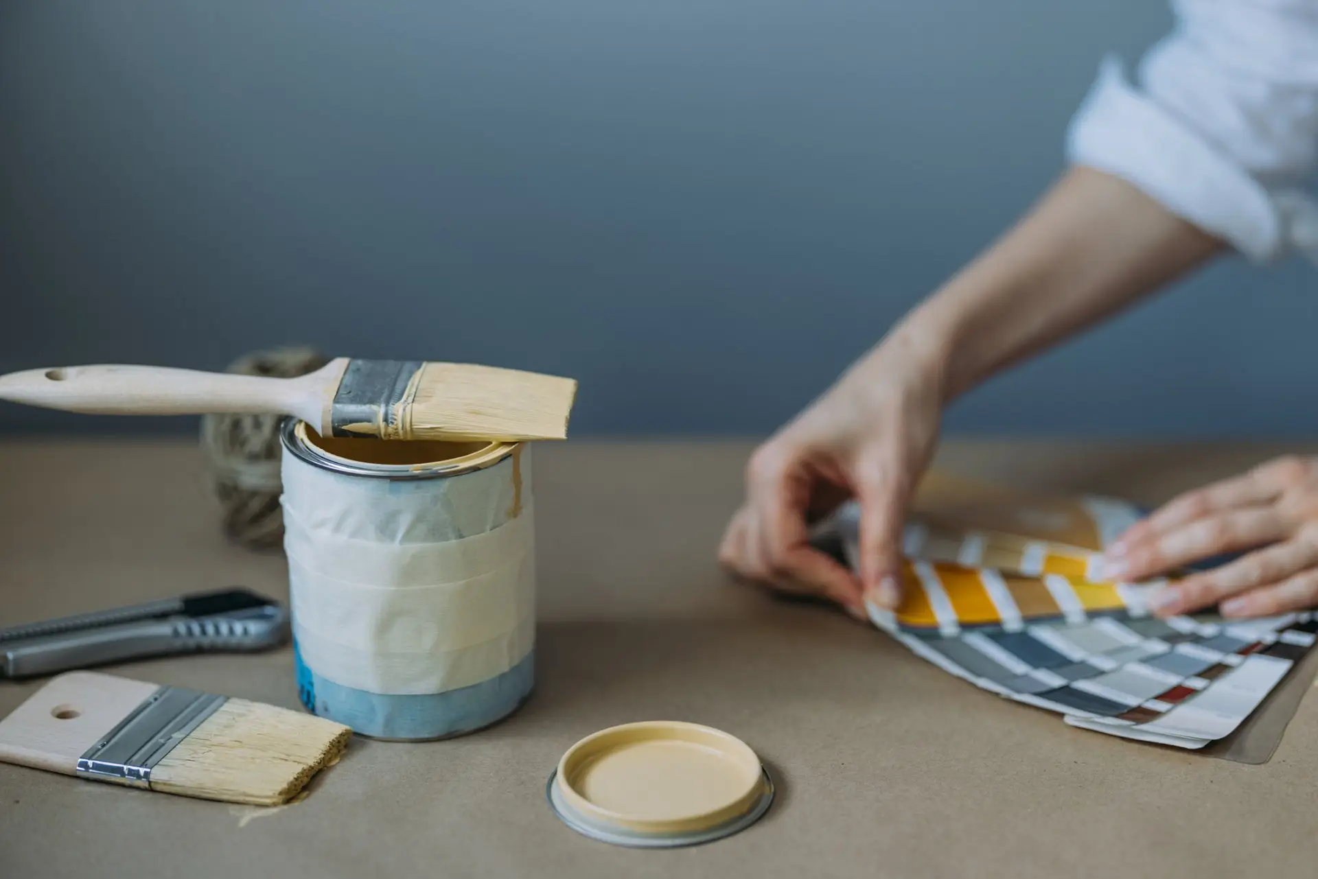 Woman testing paint colour swatches on a wall — Reno, NV — Parker’s Painting Inc.